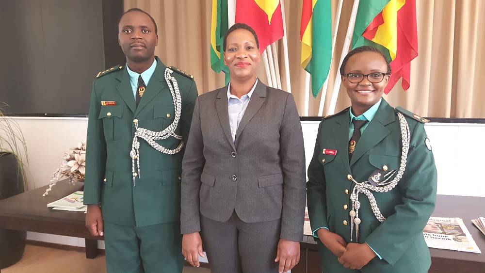 The Embassy's Head of Chancery Mrs. Naomi Zegezege Mpemba (Middle) with the two graduates, Captain Elia Joseph Lwenje (Left) and Major Veronica Henry Lyandala (Right)