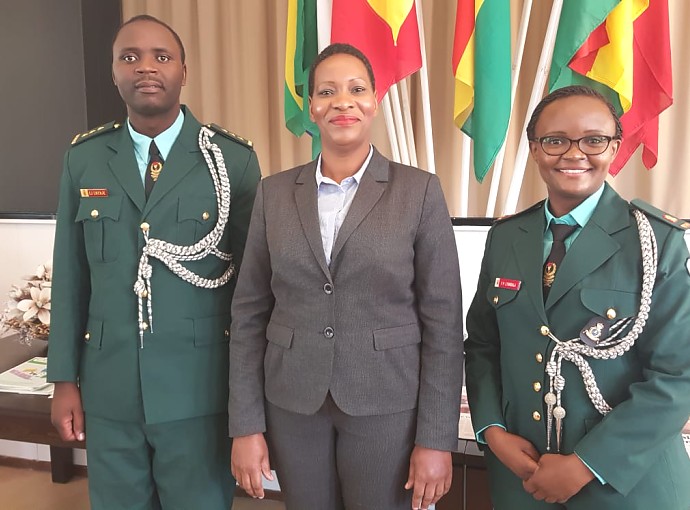 The Embassy's Head of Chancery Mrs. Naomi Zegezege Mpemba (Middle) with the two graduates, Captain Elia Joseph Lwenje (Left) and Major Veronica Henry Lyandala (Right)