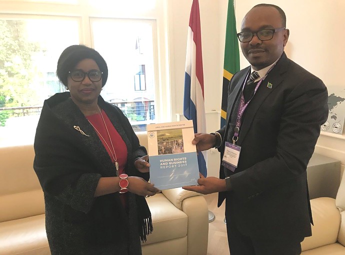 Director of Advocacy and Reforms from the LHRC, Mr. Fulgence Massawe hands a copy of Human Rights and Business Report 2017 to the Ambassador, when he visited the Embassy on 2nd May 2019