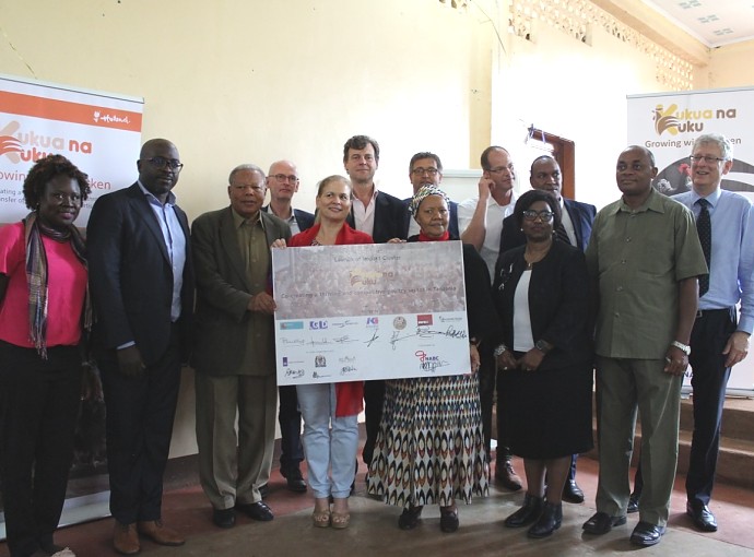Group photo after the signing of MOU between Tanzania, The Government of the Netherlands, 7 Private Dutch Companies led by Director of Trade Development and Agribusiness in the NABC Mr. Mackenzie Masaki (second from left). Far left is Ms. Theo Mutabingwa,